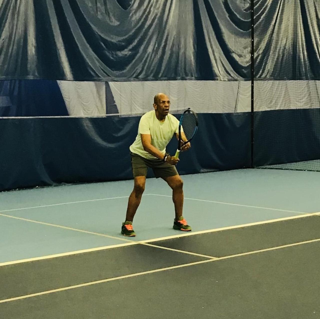 Chuck Myers playing tennis