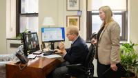Dr. Sekula in his office with NP, Caroline Gaeka