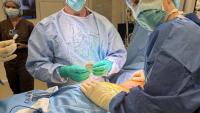 Dr. Mandigo & Dr. Joiner insert Onward Medical Device